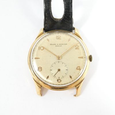 an image of a gold wrist watch on a white background