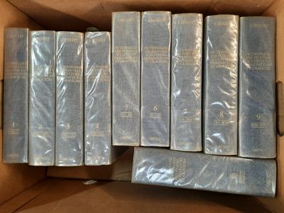 six books in a box are stacked on top of each other