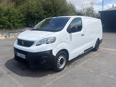 a picture of a white van parked in a parking lot