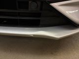 a close up of the front bumper of a car