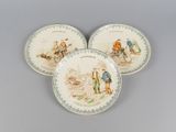 three plates with a picture of a man and a woman on them