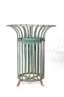 a metal trash can with a green sign on it