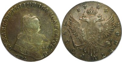 an old coin with a picture of a woman and a bird on it