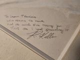 a note written on a piece of paper on the floor