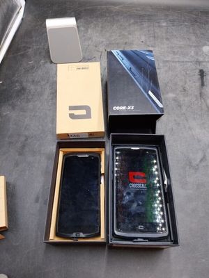 a box with a cell phone inside of it on a table