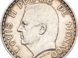 Gros plan sur une pièce de monnaie portant le visage d'un homme