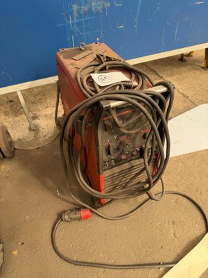 an image of a welding machine on the ground