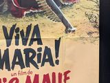 a poster for a movie with a man holding a gun