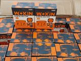 several boxes of workin wokin are stacked on top of each other