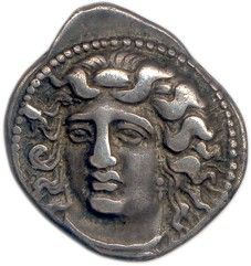 une pièce de monnaie en argent portant l'image d'un visage de femme