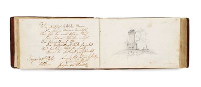 an open book with a drawing of a lighthouse on it