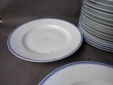 many plates stacked on top of each other on the table