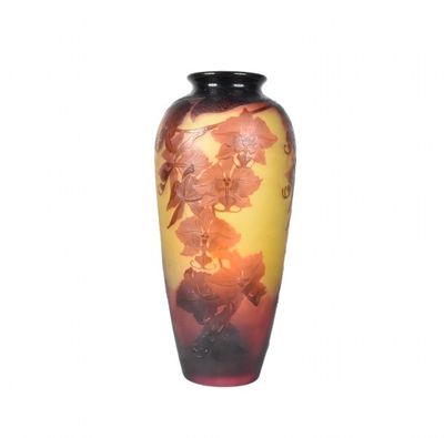 a vase that is sitting on a white surface
