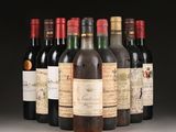 several bottles of wine are lined up on a table