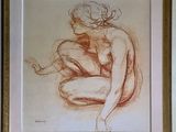 painting of a nude woman sitting on her knees in a gold frame