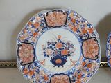 two plates that are sitting next to each other on a table