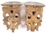 pair of antique brass wall sconces with holes in the middle