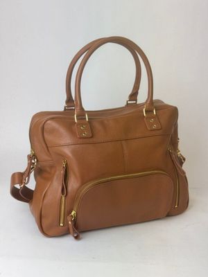tan leather handbag with zippers and gold hardwares