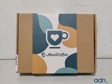 a close up of a box with a cup of coffee on it