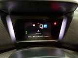 a car dashboard with a digital display on it