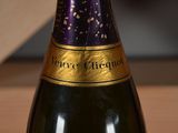 a bottle of wine that is sitting on a table