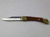 a knife that is laying on a table