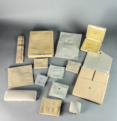 many different types of wallets laid out on a table