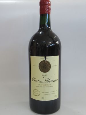 a bottle of wine that is sitting on a table