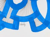 a drawing of a blue and white design on a piece of paper