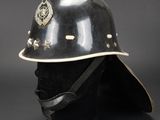 a black and white helmet on a mannequin head