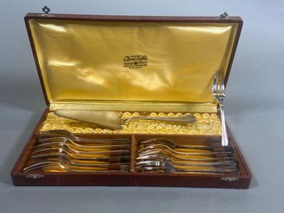 a wooden box with a set of silverware in it