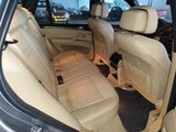 a view of the inside of a car from the driver ' s seat