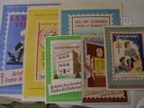 a lot of books that are on a bed