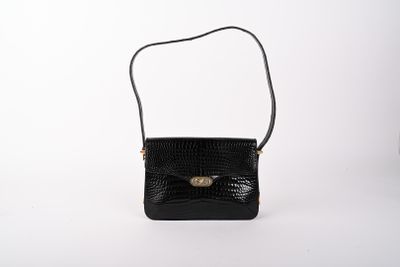 Sac en cuir façon crocodile. 20 x 24 cm.