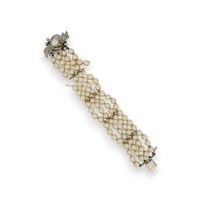 Bracelet de 4 rangs de perles de culture scandés de barrette…