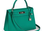 a green handbag on a white background