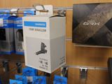 a box that is hanging from a rack in a store