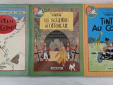 trois livres pour enfants racontant les aventures de Tintin, Tintin, Tintin et Tintin, et