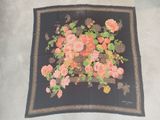 black silk scarf with pink and yellow flowers on a black background
