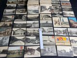 a lot of old postcards that are on the table