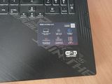 a credit card sitting on top of a laptop keyboard