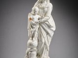an image of a statue of a woman holding a child