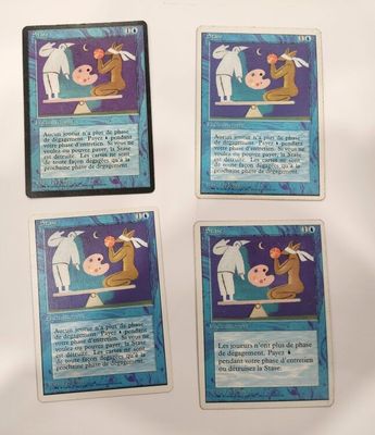 quatre cartes d'un jeu représentant un cheval et une chèvre