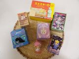 a small basket with a lot of different items on it