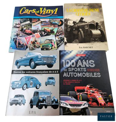 three books of cars and vintage cars on display on a white surface