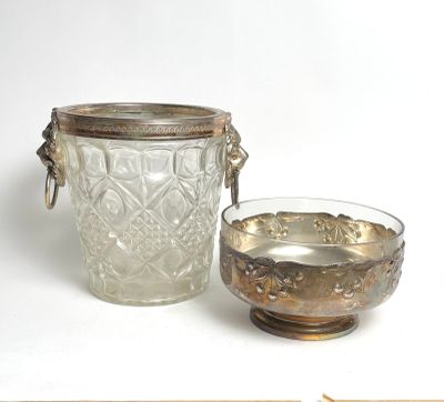 a glass jar and a bowl sitting next to each other