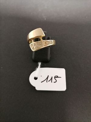 a close up of a ring with a tag on it