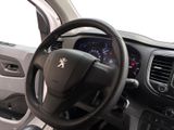 dashboard of a car with a steering wheel and dashboard controls