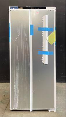 an image of a refrigerator with tape taped around it