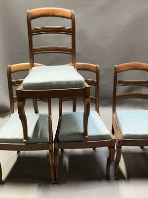 SUITE DE QUATRE CHAISES en acajou et placage d'acajou, du XI…